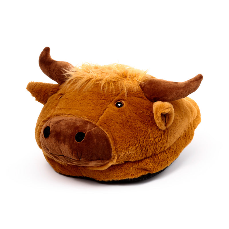 Highland Coo Plush Maxi Slipper Foot Warmer on a sofa