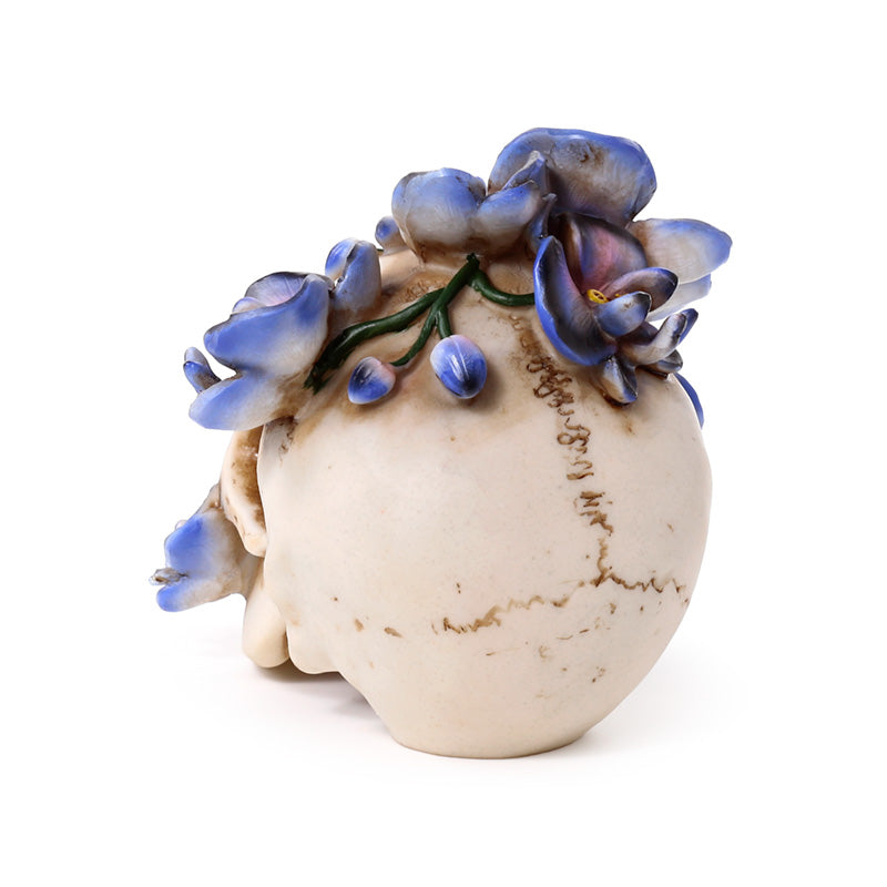 Unique skull ornament featuring purple vine accents