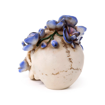 Unique skull ornament featuring purple vine accents