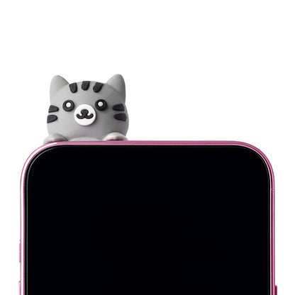 Adoramals PVC Phone Charm on a smartphone