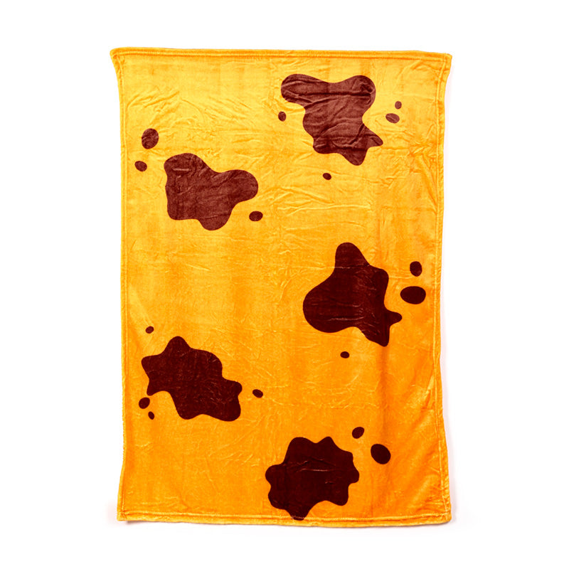 Cozy blanket hidden inside Highland Coo plush