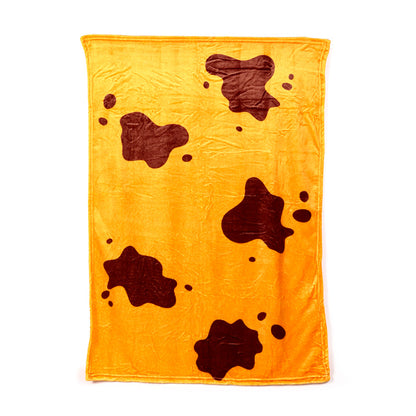 Cozy blanket hidden inside Highland Coo plush