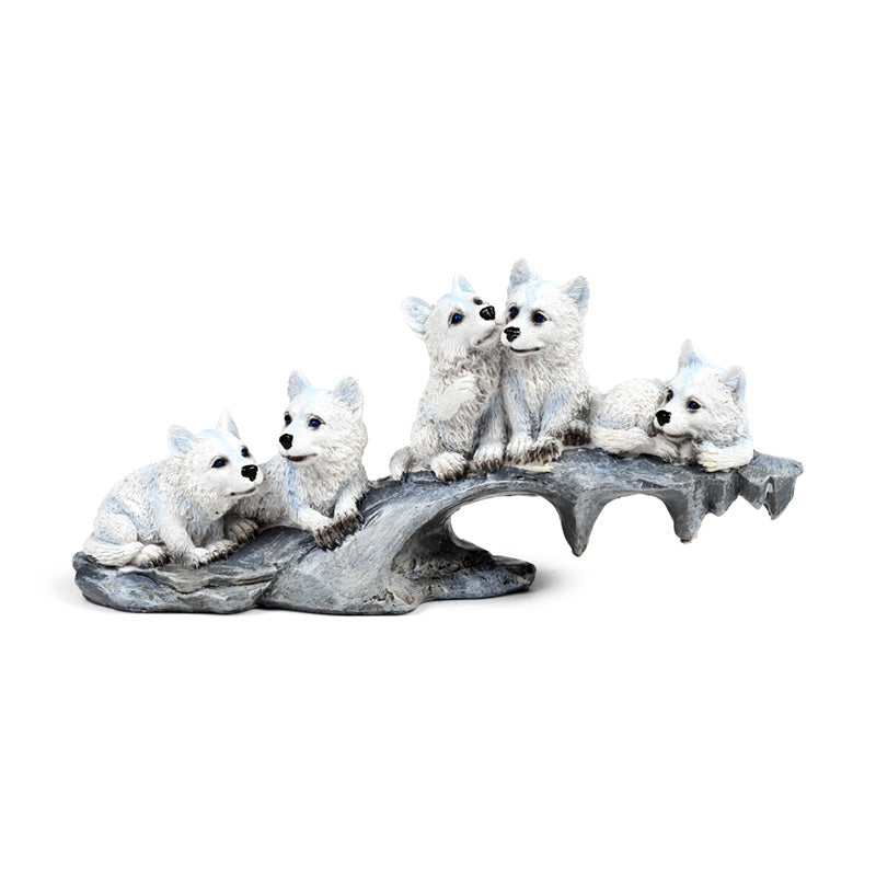 Detailed wolf ornament showcasing playful puppies