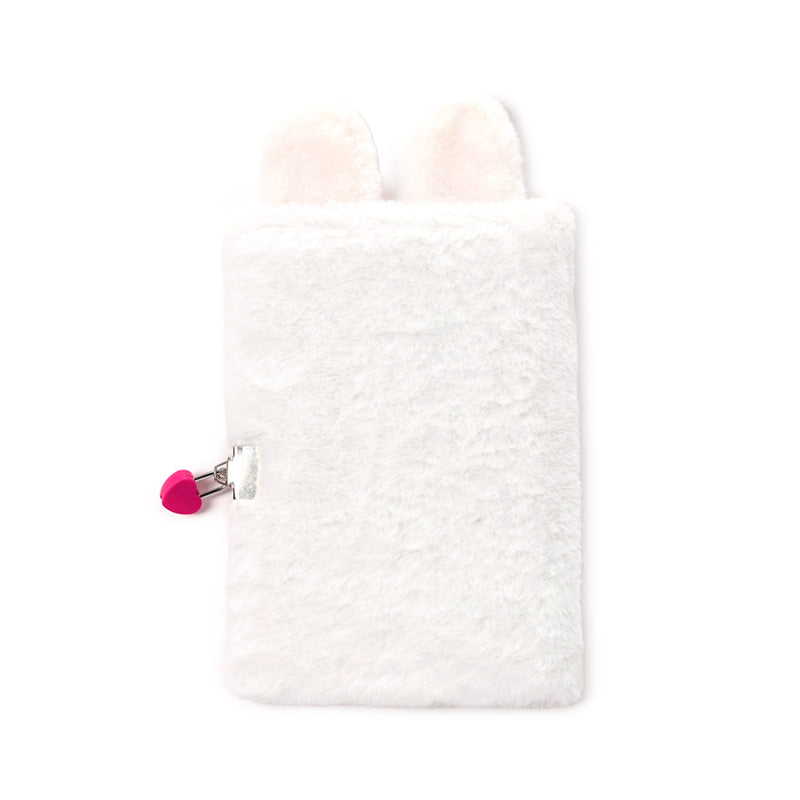 Plush A5 Notebook displayed with decorative items