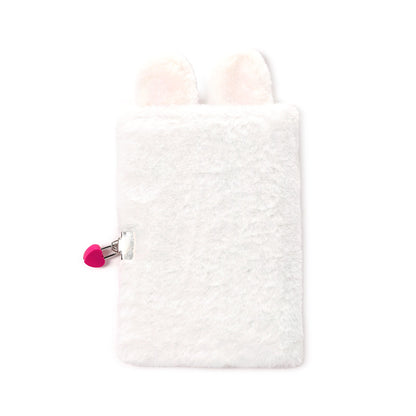 Plush A5 Notebook displayed with decorative items