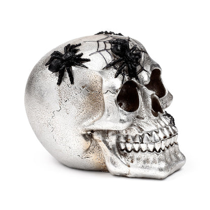 Decorative skull ornament displayed on a shelf