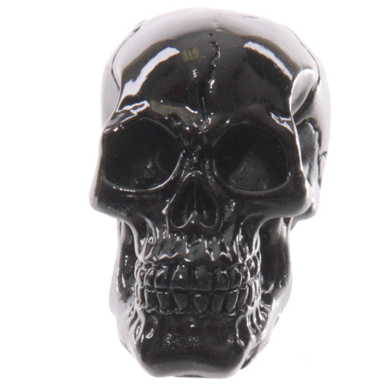 Playful glossy small skull ornament