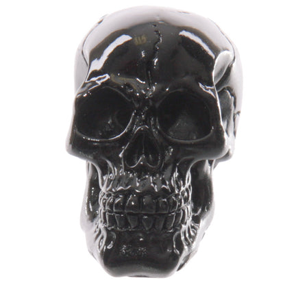 Playful glossy small skull ornament