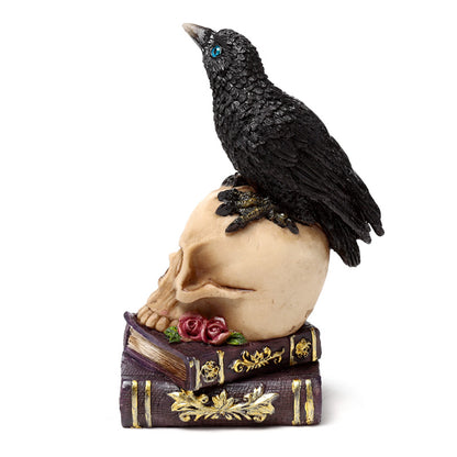 Vintage books and skull with crow decorative ornament