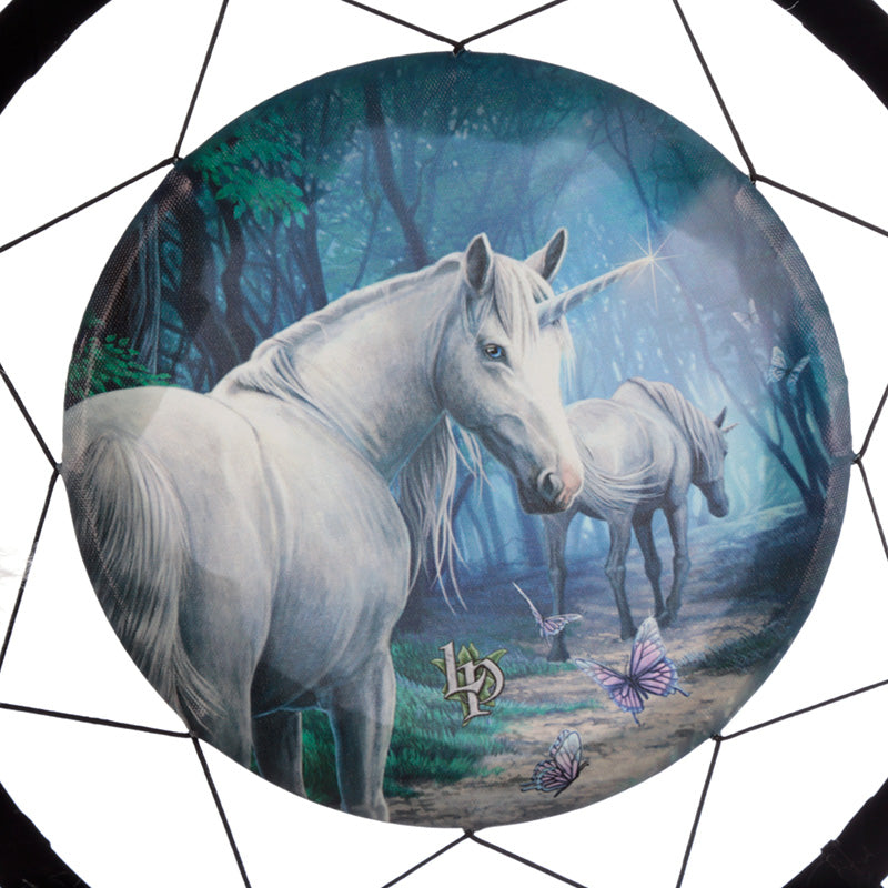 Close-up of Lisa Parker's unicorn dreamcatcher with feathers and beads