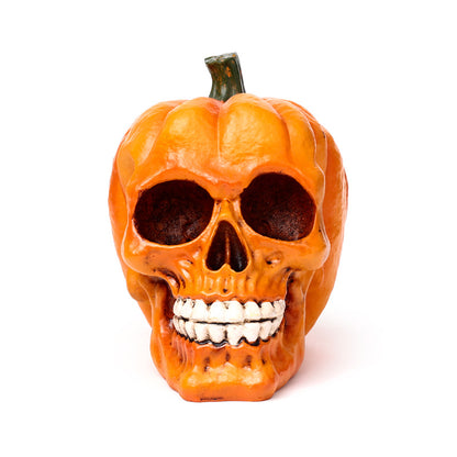 Pumpkin Skull Decorative Ornament displayed on a shelf