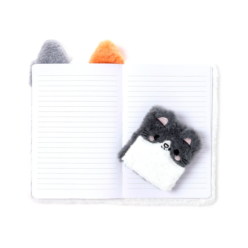 Stylish display of Lola the Cat Plush Notebook set
