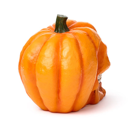 Pumpkin Skull Decorative Ornament on a mantel
