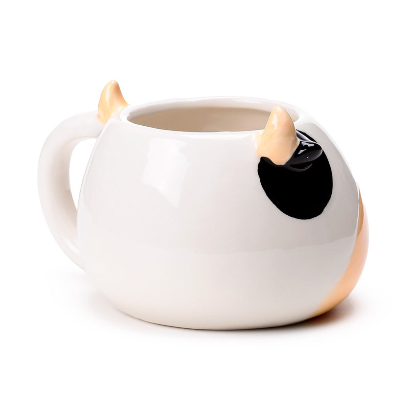 Whimsical black and white cow mug