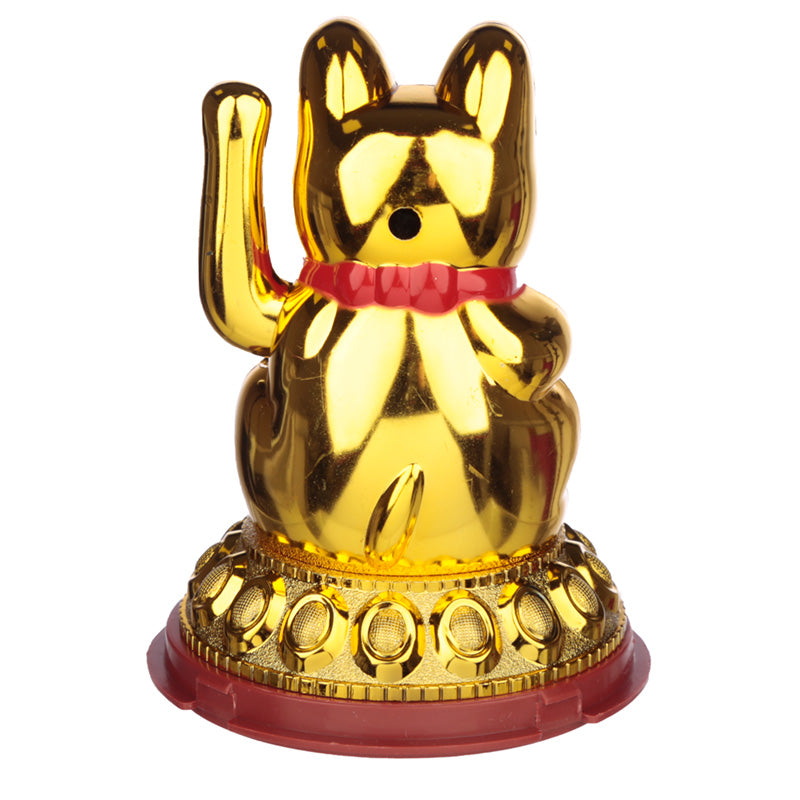 Solar-powered Maneki Neko ornament in sunlight