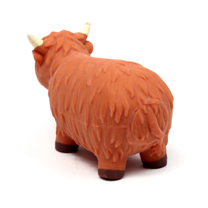 Highland Coo Stretchy Fidget Toy showcased with other collectibles