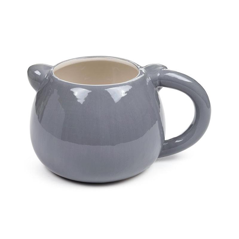 Whimsical raccoon mug for coffee and tea