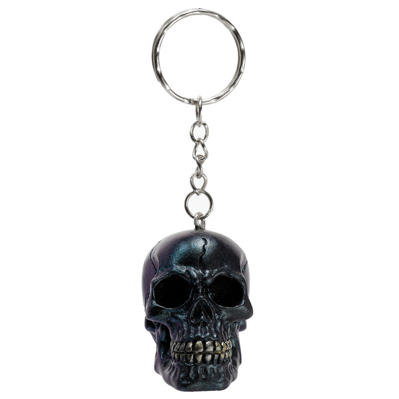 Skulls and Roses Metallic Skull Keyring displayed with other decor