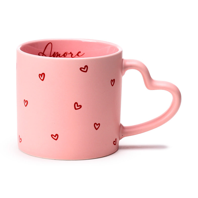 Amore Heart Shaped Handle Mug filled with coffee