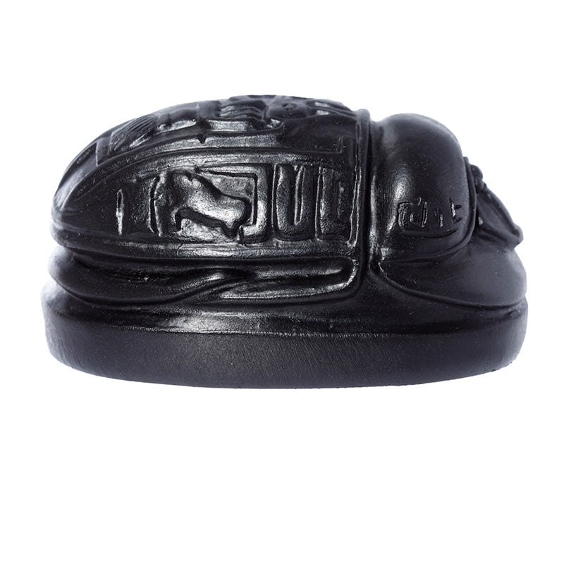 Black Egyptian Scarab Ornament displayed on a shelf