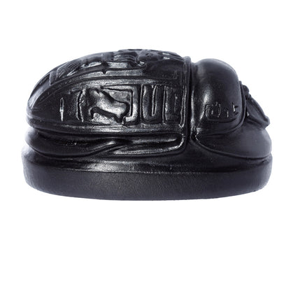 Black Egyptian Scarab Ornament displayed on a shelf