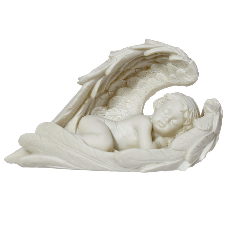 Close-up of Sleeping Cherub Figurine