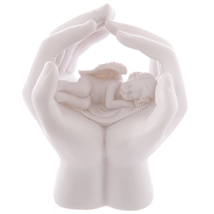 Close-up of LED Cute Hands and Sleeping Cherub Ornament