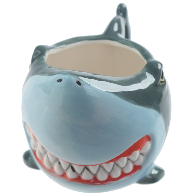 Shark mug displayed on a table