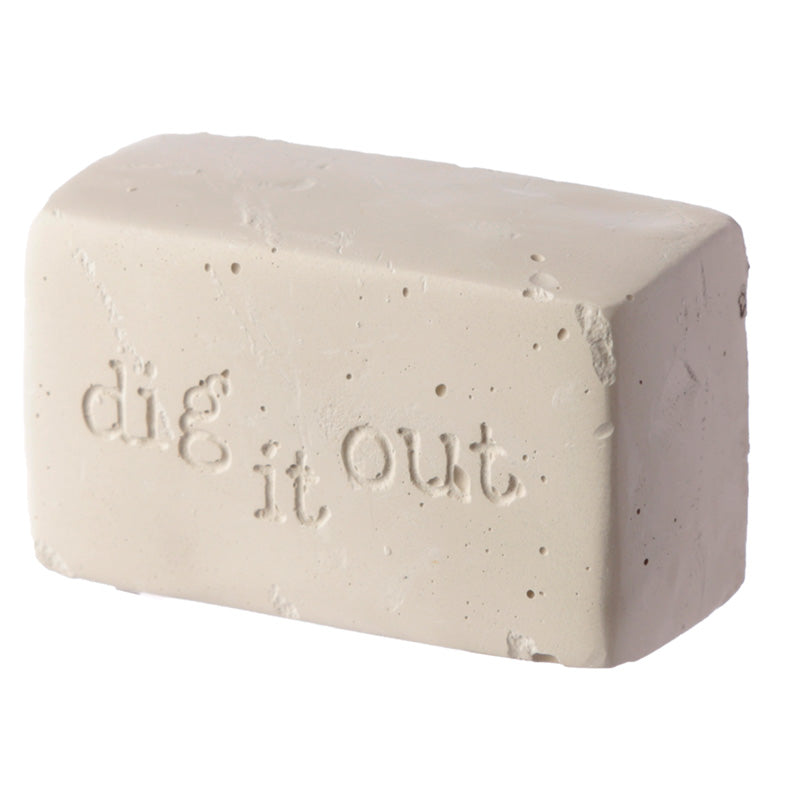 Child enjoying the Dinosaur Excavation Dig It Out Kit