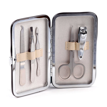 Close-up of manicure set tools with London motifs
