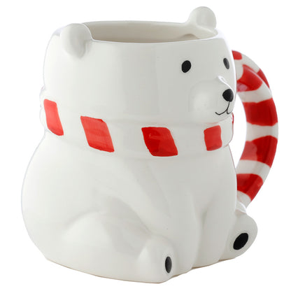 Whimsical polar bear mug on a table