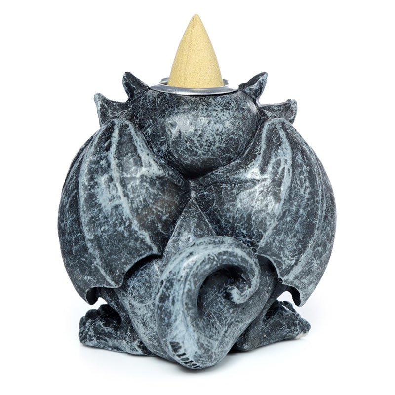 Gargoyle incense burner on a heatproof surface
