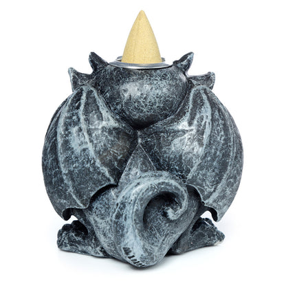 Gargoyle incense burner on a heatproof surface