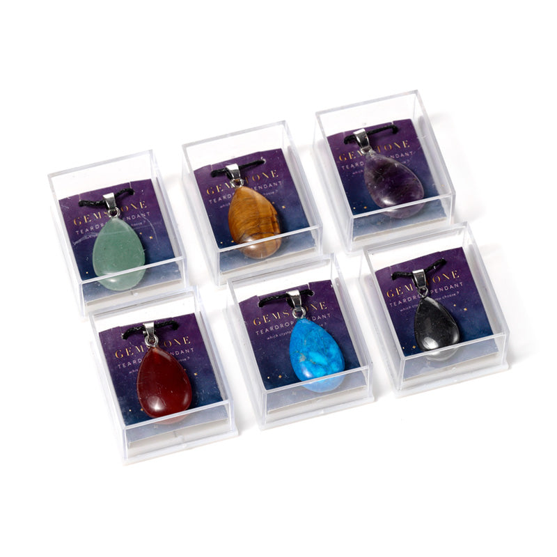 Close-up of teardrop gemstone pendant showcasing unique colours