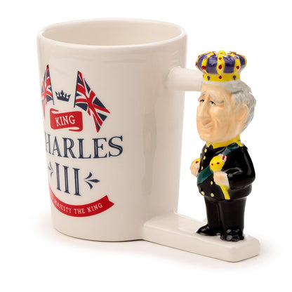 Decorative King Charles III mug displayed on table