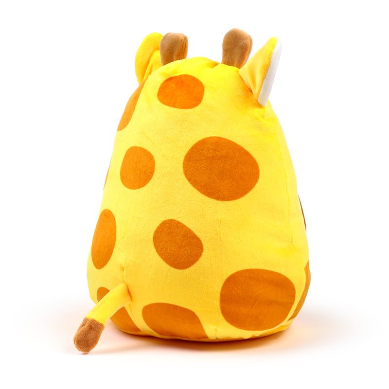 Raffi the Giraffe plush toy in a child's room