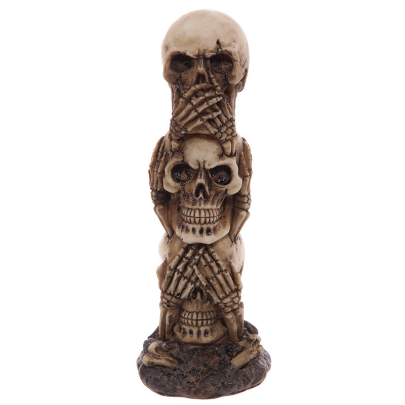 Gruesome Skull Totem Ornament displayed on a shelf