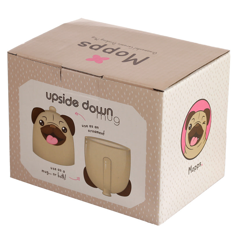 Novelty ceramic mug featuring Mopps Pug in a playful setting