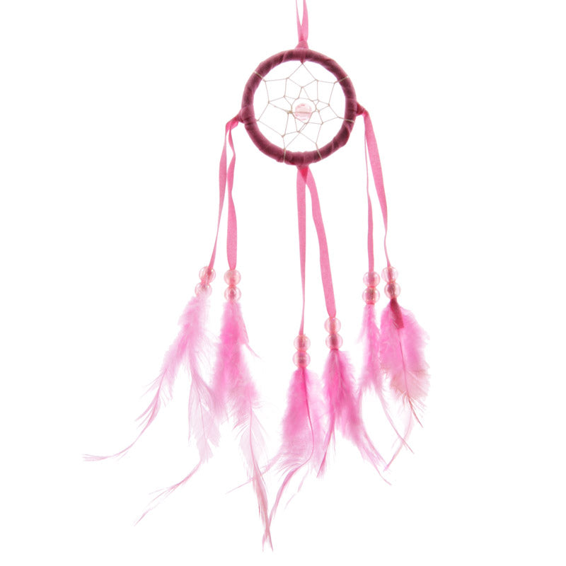 Bright Mini Feather Dreamcatcher in a serene room setting