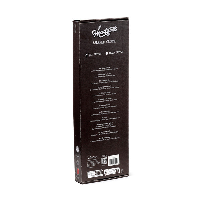 Guitar shaped wall clock displayed in a music studio