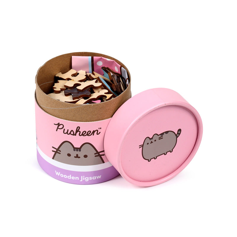 Puzzle pieces of Pusheen the Cat on a table