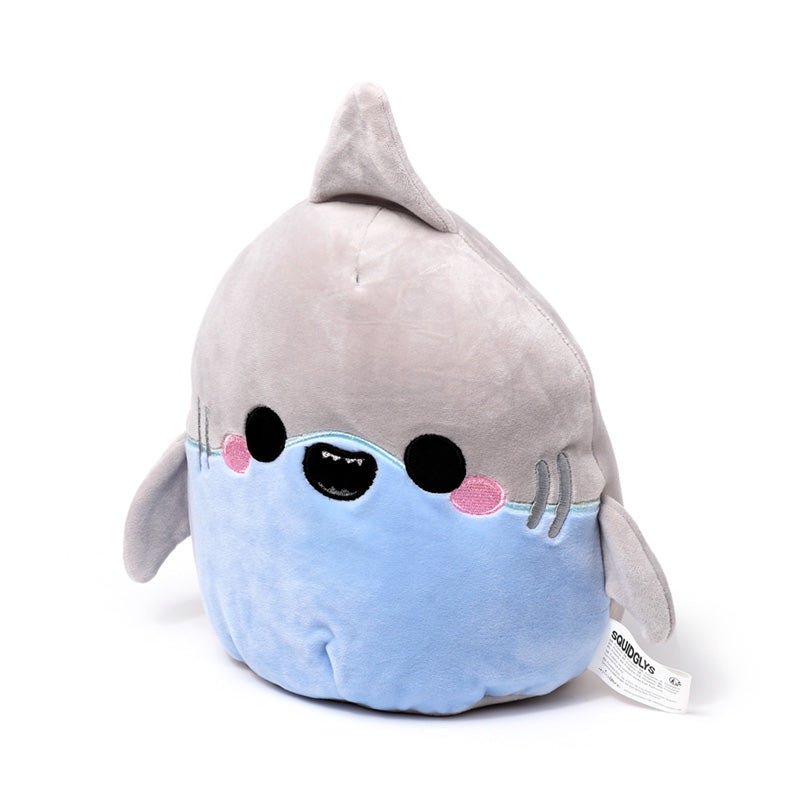 Adoramals Archie the Shark plush toy displayed in a child's room