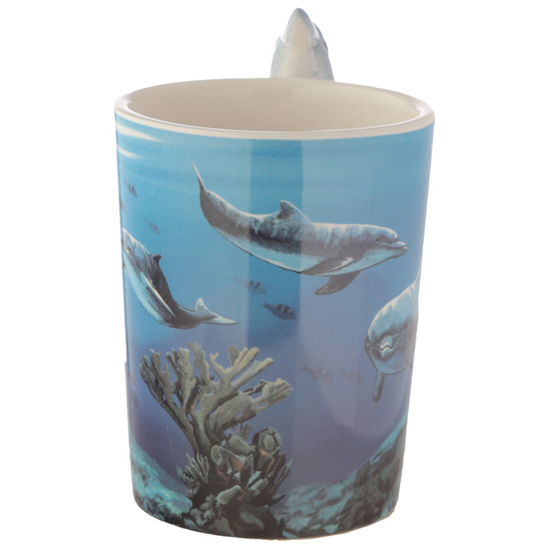 Ceramic mug with dolphin handle on display