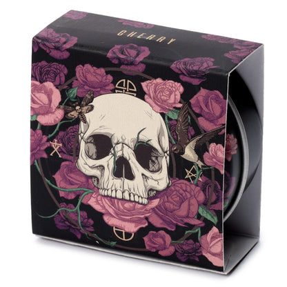 Close-up of the Skulls and Roses Lip Balm tin