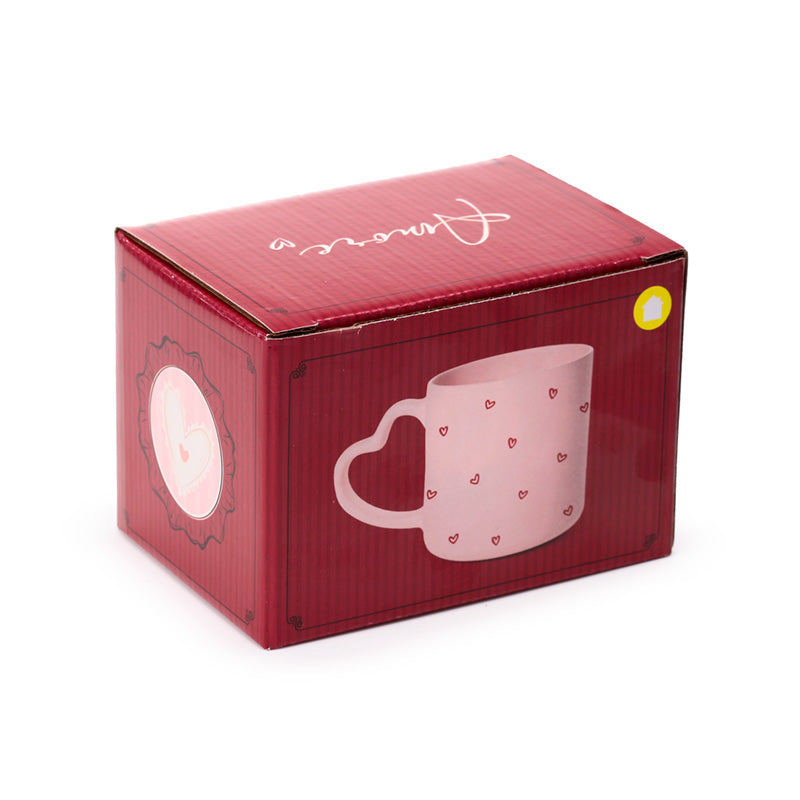 Amore Heart Shaped Handle Mug in a romantic setting
