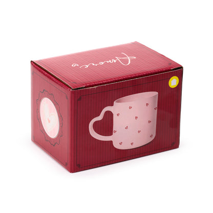 Amore Heart Shaped Handle Mug in a romantic setting