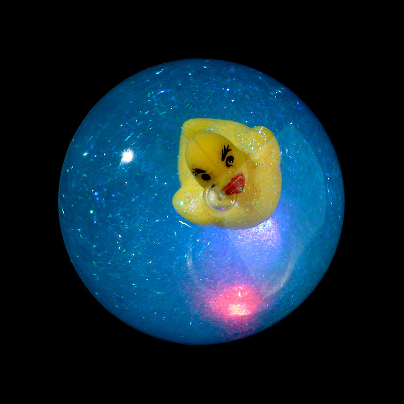 Child playing with LED High Bounce Ball Toy