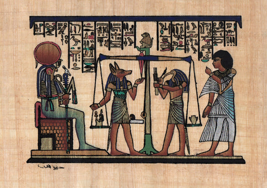 Egyptian papyrus painting depicting the Weighing of the Heart scene with Anubis and Osiris