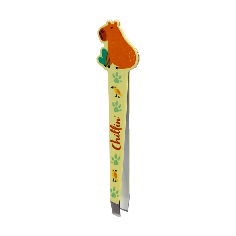 Decorative Capybara Tweezers on a vanity