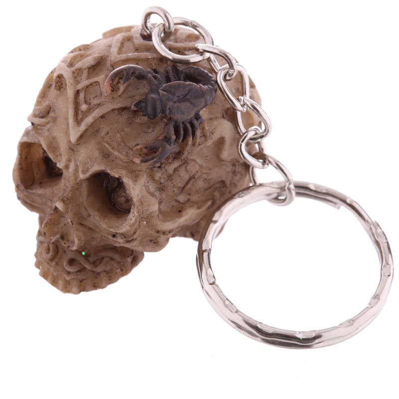 Unique Celtic Skull Keyring on a decorative surface
